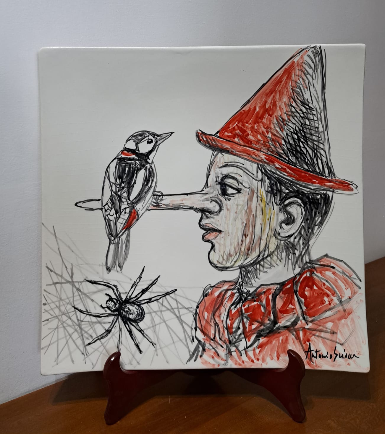 5611daa4-13e9-421f-9ea4-98a27adac4ad Piatto in Ceramica di Deruta Pinocchio quadrato 46 cm - immagine 1